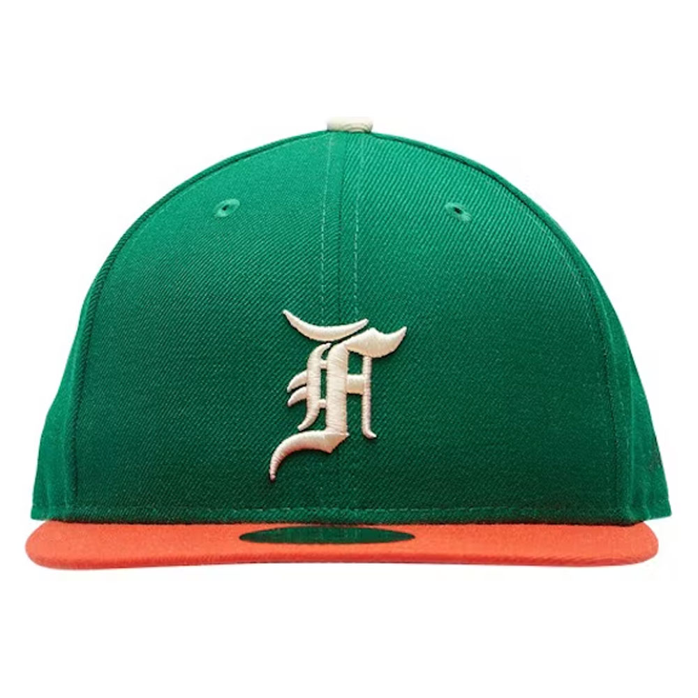 Fear of God Essentials New Era 59Fifty Fitted Hat- Green, New Era" collaboration, fitted style, and any notable features to aid those who rely on text descriptions for visual content.